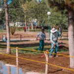 Refuerza Estado áreas verdes del Parque Central con siembra de pasto